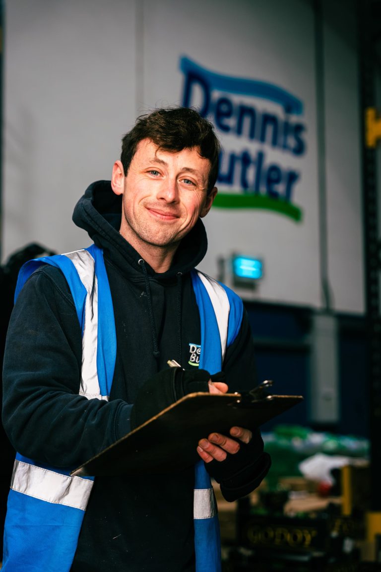 man in warehouse taking order