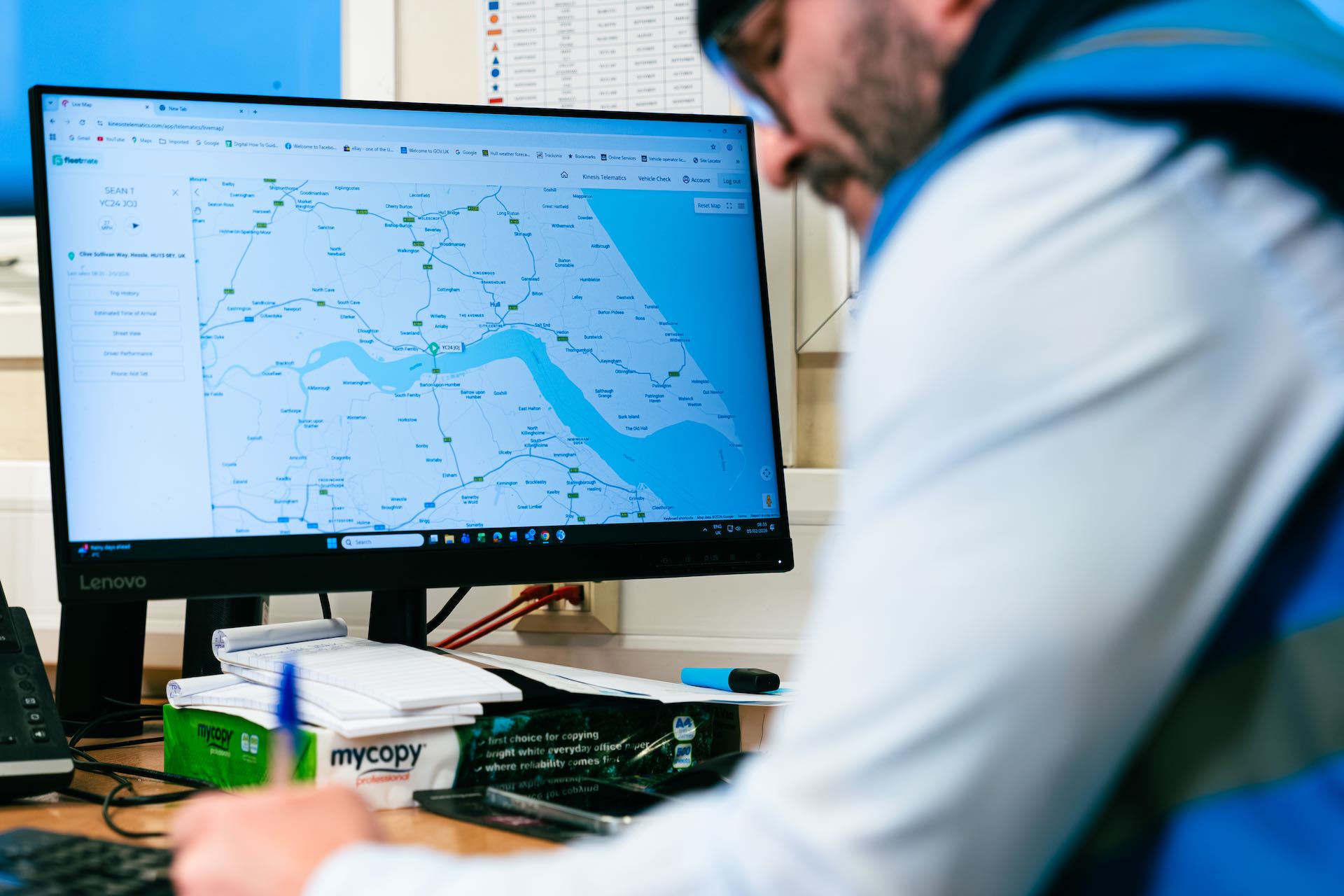 man looking at distribution map on screen